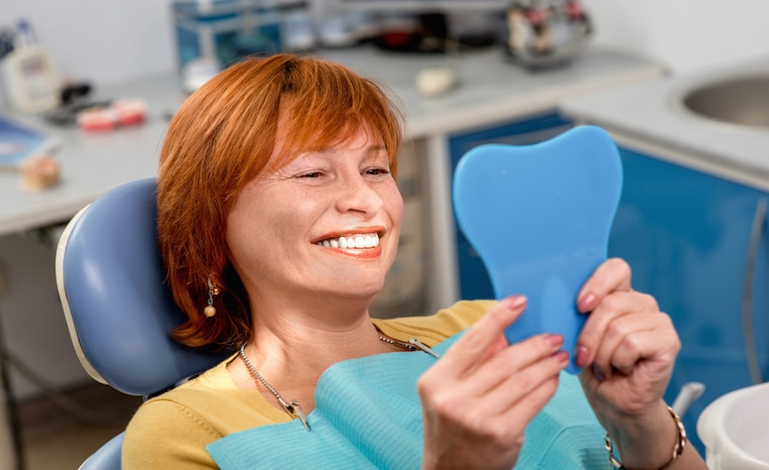Senior woman in the dental office.